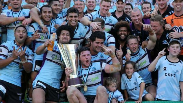 Party time: Sharks players celebrate their win over Windsor in the NSW Cup grand final.