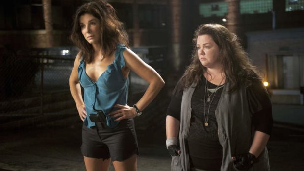 Juggling motherhood with living on set ... Sandra Bullock and Melissa McCarthy in the film <i>The Heat</i>.