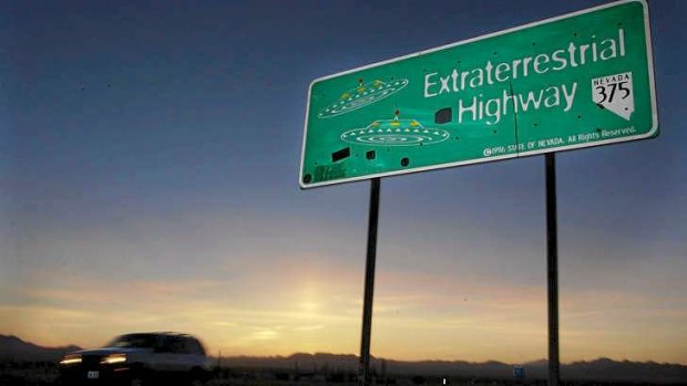 A car moves along the Extraterrestrial Highway in Nevada, USA.