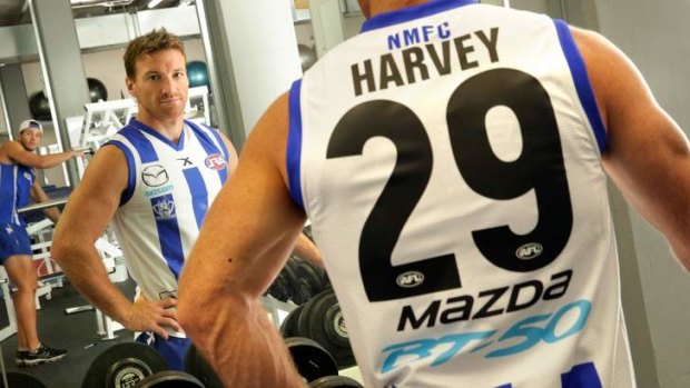 Good idea: North Melbourne's Brent Harvey wears a jumper bearing his name.