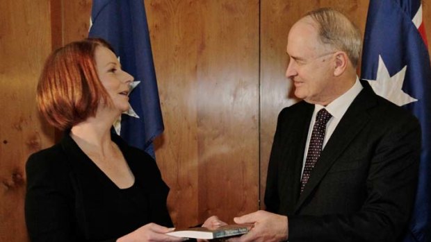 Professor Ross Garnaut presents the final report of his climate change review to Prime Minister Julia Gillard.