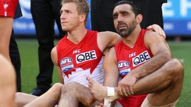Pain: Kieren Jack and Adam Goodes after the match.