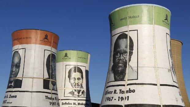 Faces of former presidents of the African National Congress members Oliver Tambo, Sefako Makgatho, Thabo Mbeki and current president Jacob Zuma decorate the cooling towers ahead of the upcoming ANC centenary celebration in Bloemfontein.