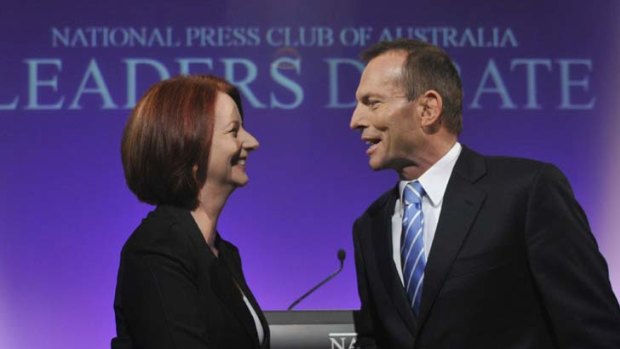 Plain speaking: Julia Gillard and Tony Abbott ahead of the first leaders debate at the National Press Club last year.