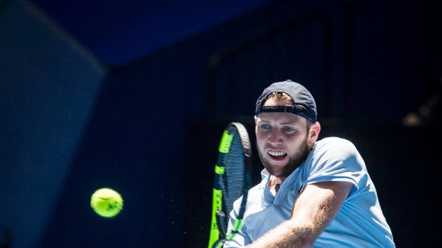 Opening victory: Jack Sock of the United States takes on Karen Khachanov.