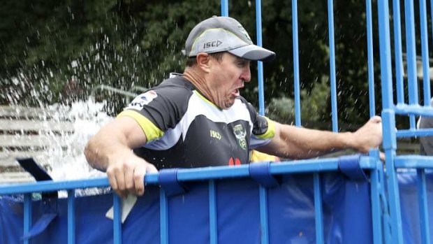 Canberra Raiders coach David Furner drops into the dunk tank.