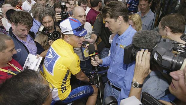 Friends now foes ... Frankie Andreu interviews  Lance Armstrong before stage one of the 2002 Tour De France.