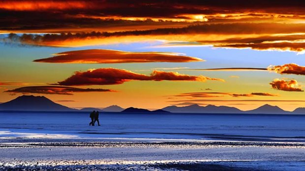 Memorable sights: A fiery sunset over the Salar de Uyuni in Bolivia.
