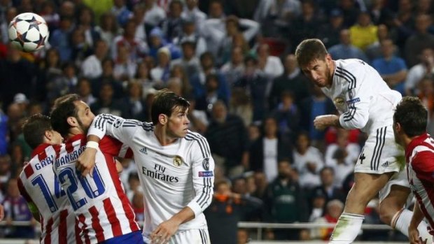 The saviour: Sergio Ramos keeps Real Madrid alive in the final with a goal in stoppage time.