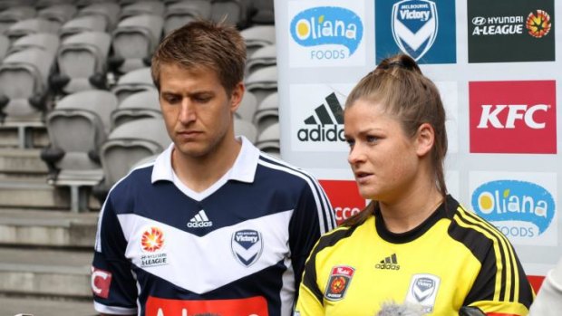 Centre stage: Melbourne Victory stars Adrian Leijer and Brianna Davey.