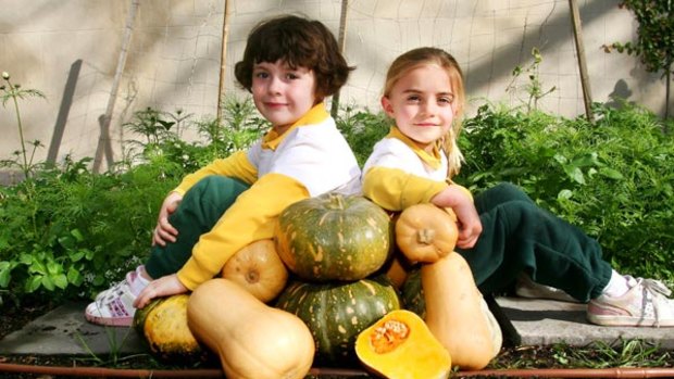 Butter nuts...Crown Street Public school kindy students Antonia McAneny (left) and Isabella Harris.