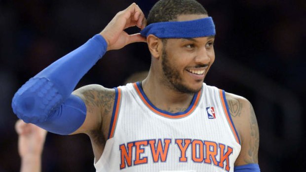 New York Knicks forward Carmelo Anthony smiles during the third quarter of the win over the Cleveland Cavaliers.