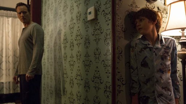 Patrick Wilson (left) and Ty Simpkins in <i>Insidious Chapter 2</i>.