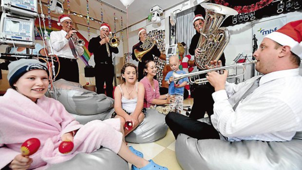 Play it again...Sydney Symphony members perform for children in the Starlight Room at the Children's Hospital at Westmead