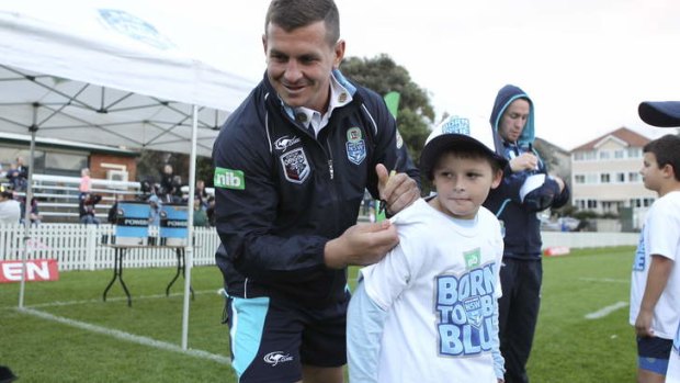 Greg Bird signs autographs after a training session at Coogee Oval on Monday.