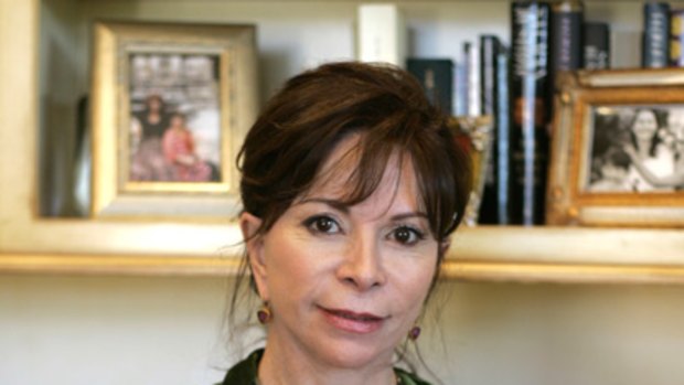 Love and loss ... Isabel Allende cradles a photo of her late daughter, Paula.