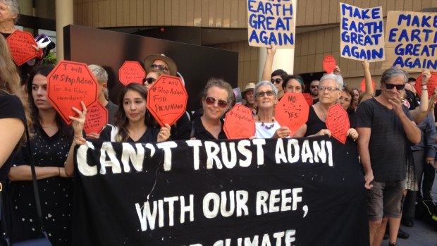 Protesters gathered as Adani's local mining chief executive Jeyakumar Janakaraj spoke at a business lunch in Brisbane.