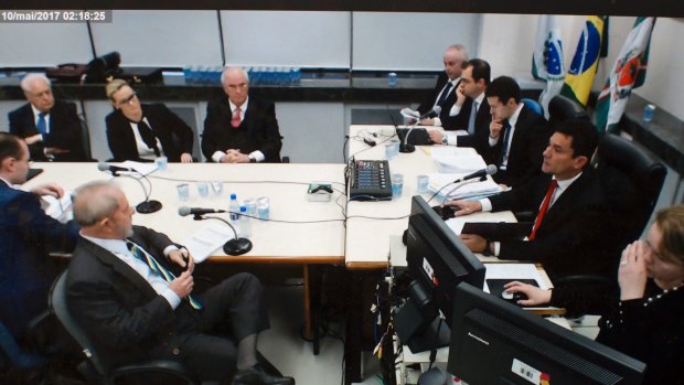 Lula, front left, testifies in the Car Wash investigation in Curitiba, Brazil, in May.