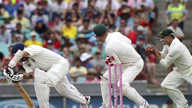 The big fish &#8230; Michael Clarke entices Sachin Tendulkar forward and gets a thin edge to the keeper, which deflects off Brad Haddin's gloves into Mike Hussey's waiting hands at first slip.