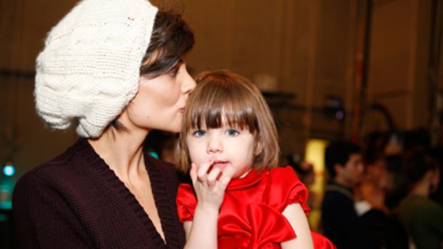 Best-dressed ... Katie Holmes and daughter Suri Cruise.