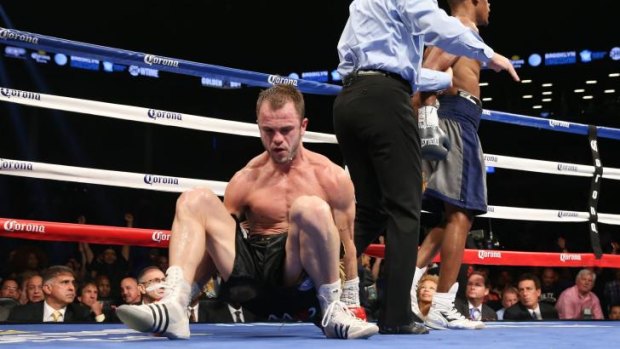 Down and out: Jarrod Fletcher was stopped by Danny Jacobs in the fifth round of their middleweight title fight.
