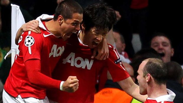 Through to the semis ...  Park Ji-Sung, centre, celebrates his goal with Wayne Rooney, right, and Javier Hernandez.