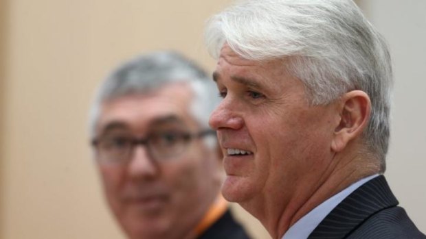Criticised: NBN chief executive officer Bill Morrow (right) and COO Greg Adcock during the Senate hearing in Canberra last Friday.