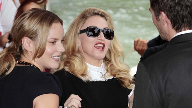 Madonna, who directed <i>W.E</i>,  chats to the movie's stars Abbie Cornish and  James D'Arcy during the 68th Venice Film Festival in 2011.