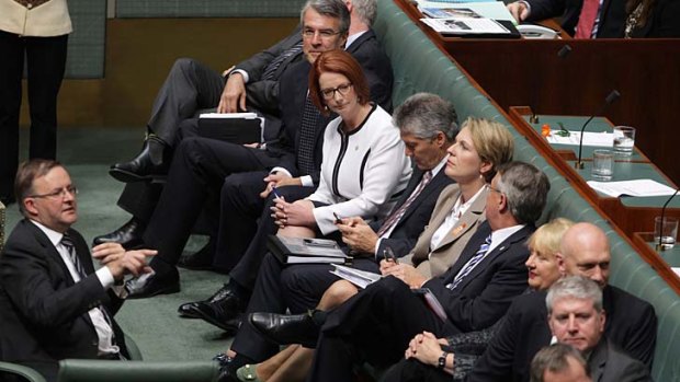 Should I stay or should I go: Julia Gillard looks to supporters on Thursday.