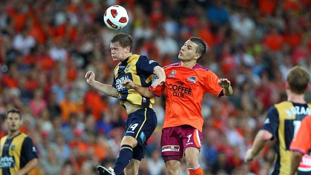 Take no prisoners: Brisbane Roar and Central Coast Mariners go into battle for the 2011 A-League grand final trophy.