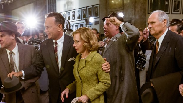 Tom Hanks, Amy Ryan and Alan Alda (far right) in <i>Bridge of Spies</i>.
