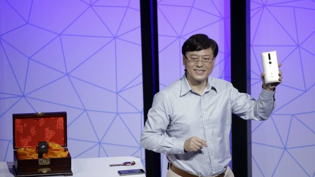 Lenovo Chairman and CEO Yuanqing Yang holds up the new Phab2 Pro phone.
