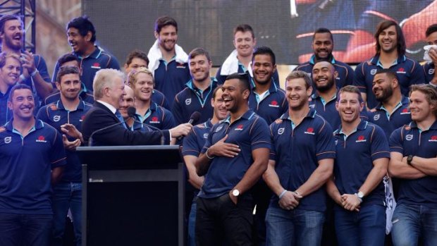 Not giving anything away: Kurtley Beale was keeping his cards close to his chest as the Waratahs were honoured in Martin Plae.