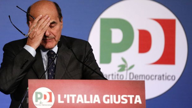 Italian PD (Democratic Party) leader Pier Luigi Bersani reacts during a news conference in Rome February 26, 2013.