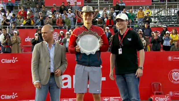 Bernard Tomic with the spoils of victory in Colombia.