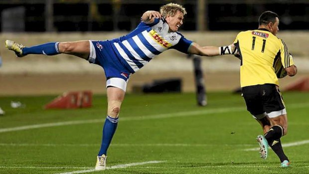 Not much gets past him: Jean de Villiers (left) in action for the Stormers.