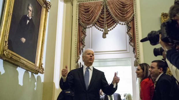 Deal-maker ... the US vice president, Joe Biden, leaves a meeting with Senate Democrats in the last hours of negotiations.