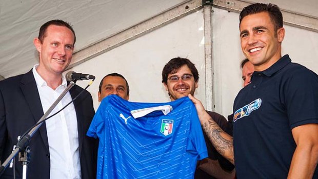 Honorary member: Fabio Cannavaro, right, presented the mayor of Leichhardt Darcy Byrne with a signed Italian jersey.