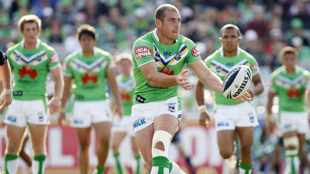 Terry Campese of the Raiders passes the ball during the round six NRL match between the Canberra Raiders and the New Zealand Warriors at Canberra Stadium on April 8, 2012 in Canberra, Australia.