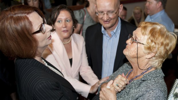 Prime Minister Julia Gillard with Veronica Voigt of Laidley, which has been affected by recent flooding.