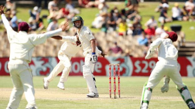 Caught Denesh Ramdin, bowled Dwayne Bravo...Australia's Michael Hussey is all askance after paying the price for defensively playing a ball that moved off the pitch and through the air. He scored 29.