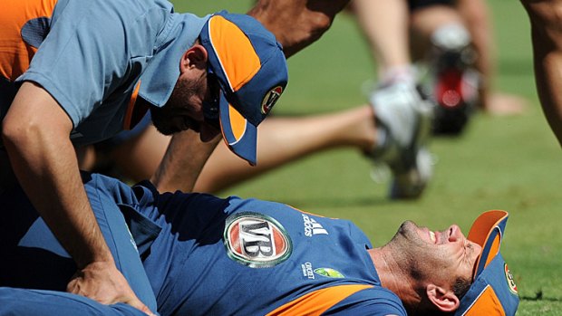 Australian captain Ricky Ponting stretches during a training session in Ahmedabad yesterday.