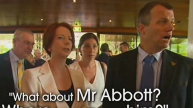 PM Julia Gillard enquires after Tony Abbott, in this screenshot from Channel Nine.
