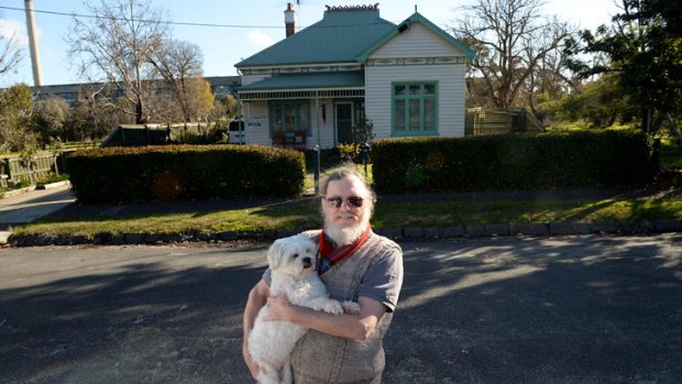 Ralph Dunstone with his dog Zoe at his Parkview Road,  Alphington.