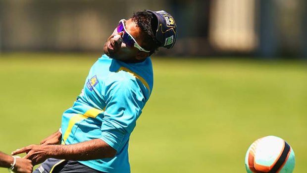 It ain't cricket ... Sri Lanka's Mahela Jayawardene gets in some round-ball practice of another kind at Bellerive on Thursday.