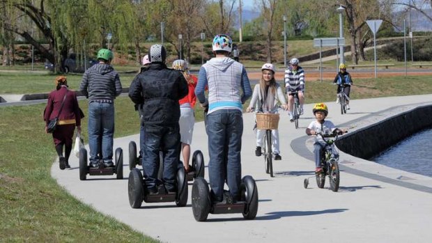 Segway riders by  Lake Burley Griffin.