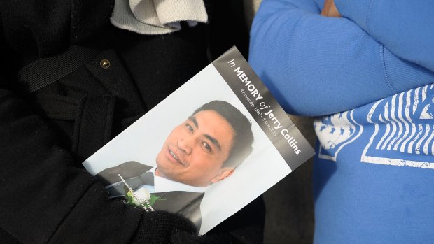 PORIRUA, NEW ZEALAND - JUNE 17:  A member of the public holds the funeral program before the service for Jerry Collins at Te Rauparaha Arena on June 17, 2015 in Porirua, New Zealand. Former New Zealand All Blacks player Jerry Collins and his wife passed away on June 5th after his involvement in a car accident in France.  (Photo by Mike Heydon/Getty Images)