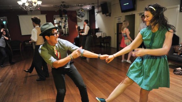 Vested interest: Kieran Yee and Vivi Kalman get into the groove at Fitzroy's Copacabana Restaurant, one of several swing dancing venues around Melbourne.