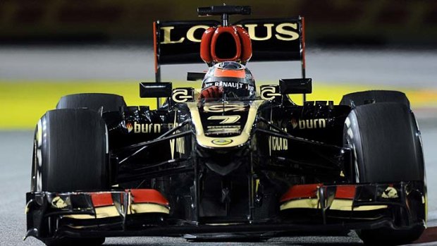 Pacey pairing: Lotus driver Kimi Raikkonen will join Fernando Alonso at Ferrari next year.
