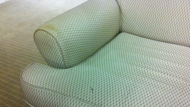 A damaged sofa in the Premier's office.